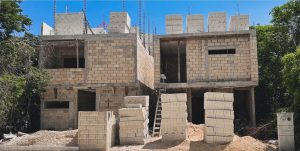 Acuerdo para construir 22 mil viviendas en Quintana Roo.