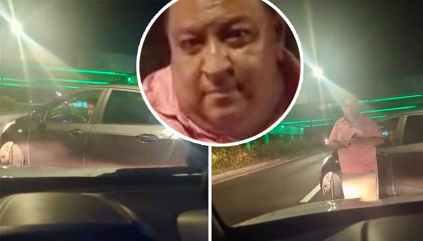 El hombre, presuntamente un taxista tradicional, bloquea el paso del vehículo de plataforma en el aeropuerto de Cancún.