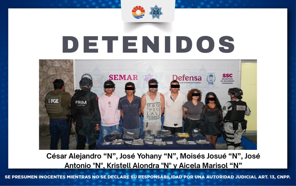 Agentes de la Guardia Nacional resguardan el área tras la detención en Cancún de seis presuntos narcomenudistas.